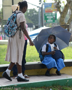 School children waiting in the rain