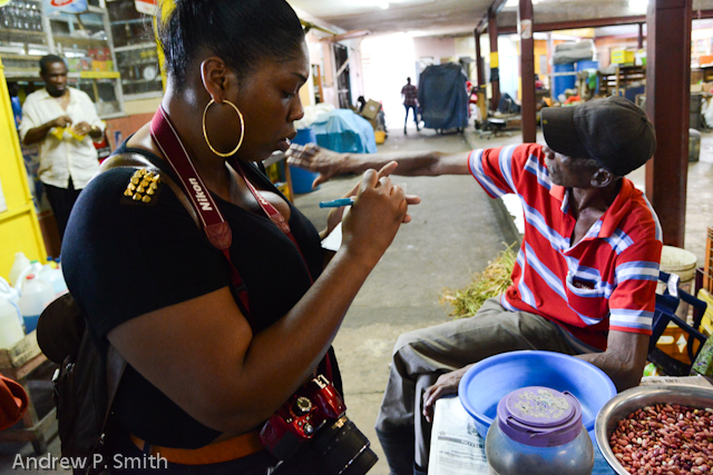 One of my photojournalism students in Papine market.