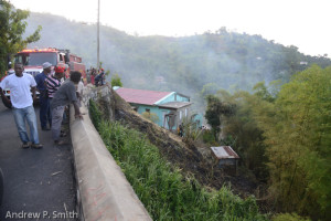 Residents of Cascade view firemen extinguishing a bush fire on July 5 2014