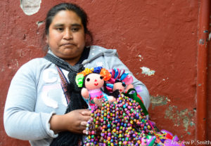 A vendor pauses from selling her wares in San Miguel de Allende.